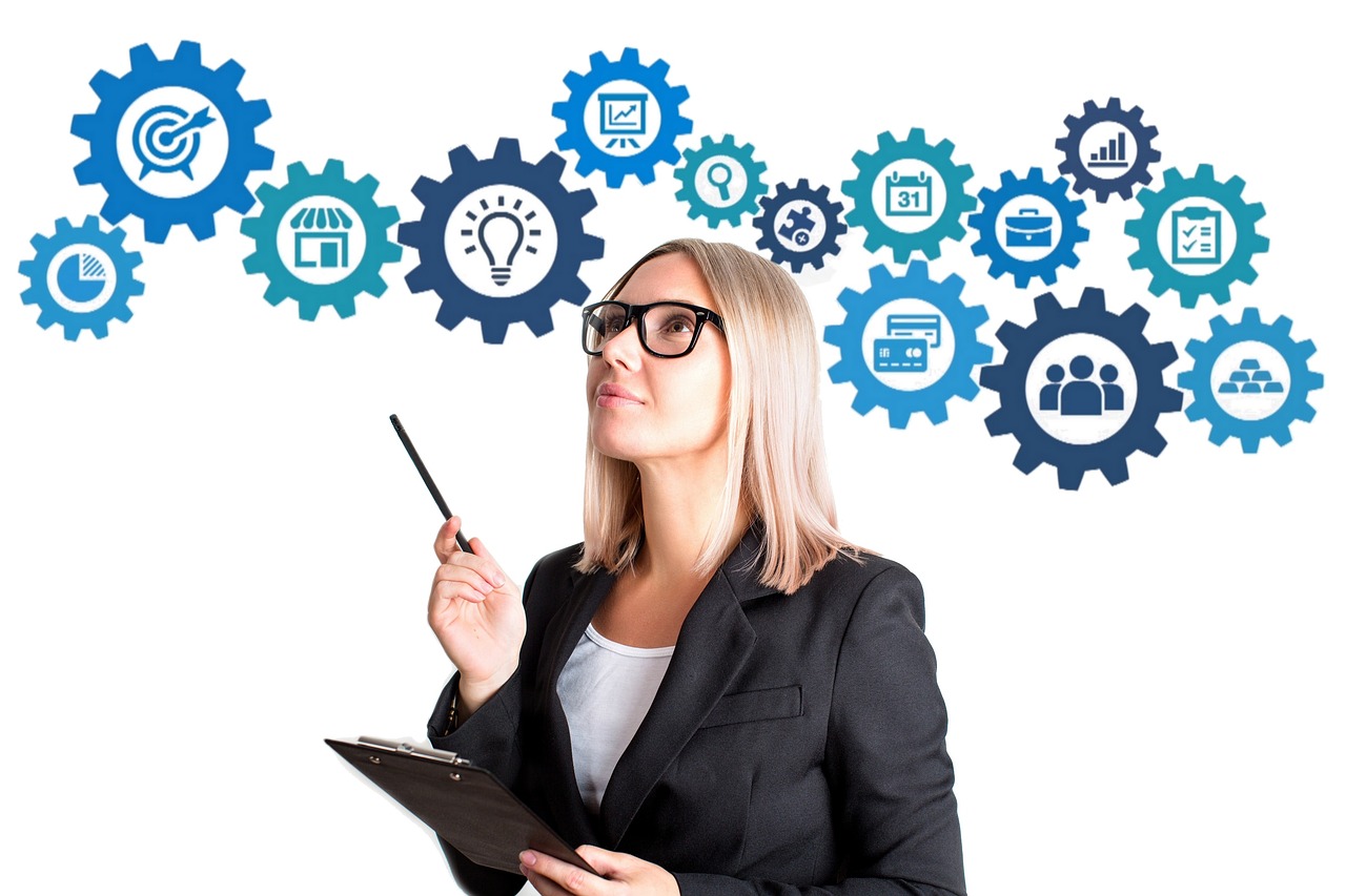 The image shows a soldier walking through a devastated area, likely a combat zone. To his left, there is a military armored vehicle covered in dust, suggesting it has seen action. In the background, buildings are severely damaged, with partially destroyed structures and broken windows. The scene has an atmosphere of desolation, with debris scattered on the ground and dry air, giving the impression of a city or area ravaged by recent conflict. The soldier, armed and dressed in combat gear, moves through the wreckage, likely on a reconnaissance or security mission in the area.